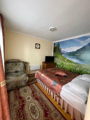 Фото номера Коттедж с видом на горы Гостиница Каприз г. Домбай 8