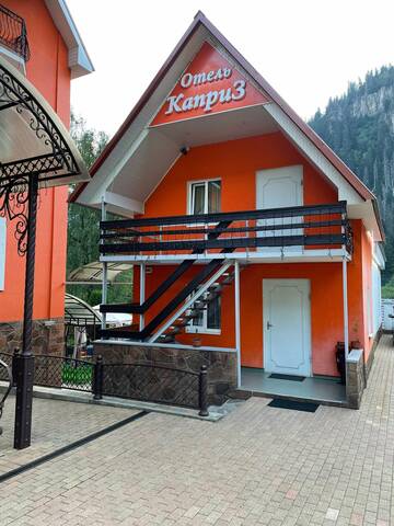 Фото номера Коттедж с видом на горы Гостиница Каприз г. Домбай 2