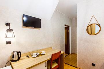 Фото номера Полулюкс с видом на горы Гостиница Aruchat Hotel г. Домбай 6
