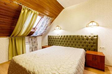 Фото номера Двухместный номер с 1 кроватью Гостиница Aruchat Hotel г. Домбай 4