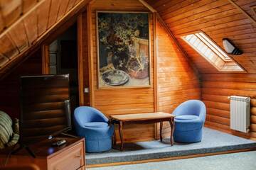 Фото номера Люкс в мансарде Гостиница Aruchat Hotel г. Домбай 5
