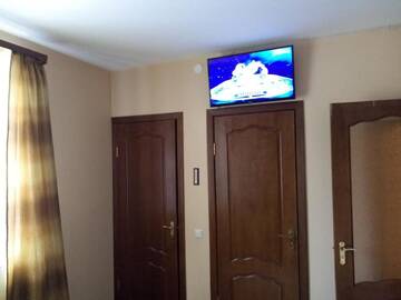 Фото номера Семейный номер с видом на горы Гостиница Aruchat Hotel г. Домбай 4