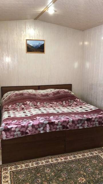 Фото номера Стандартный двухместный номер с 2 отдельными кроватями Гостевой дом Гостевой Дом Пихтовый Мыс г. Домбай 13