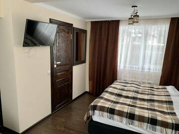 Фото номера Номер в коттедже с кухней Отель Горский Дом г. Домбай 4